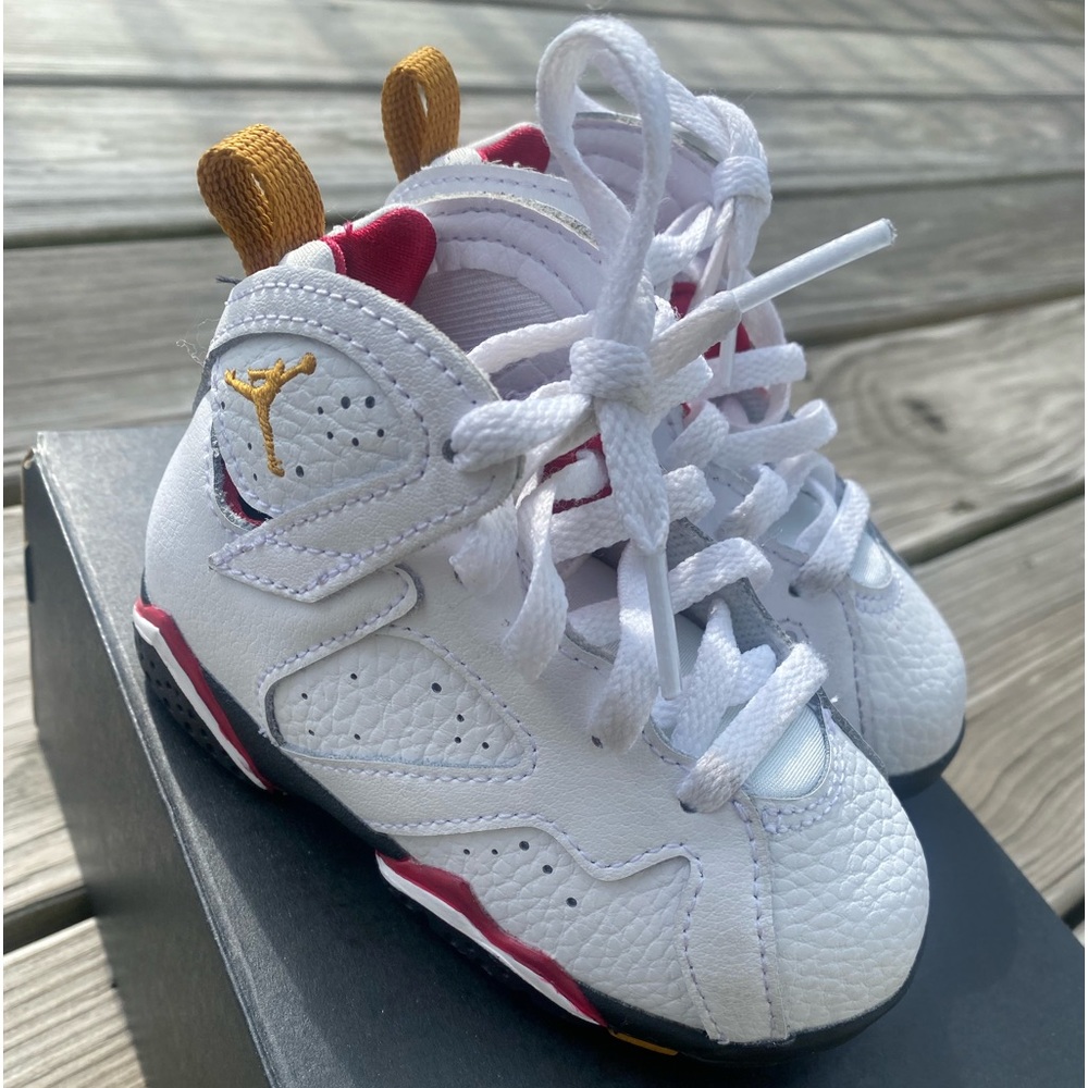 Jordan retro 7 toddler size 6C in color white, gold, black and red. Ligh…